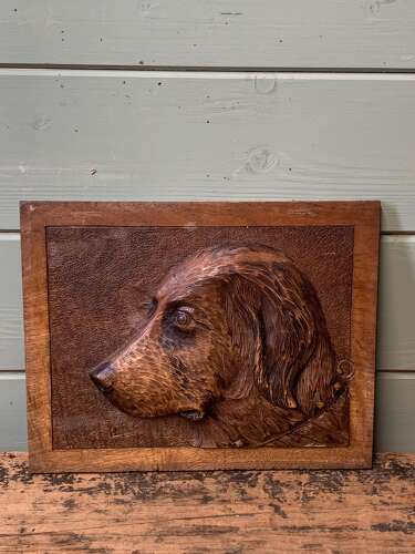 EARLY 20th C CARVED PANEL OF A DOG’S HEAD