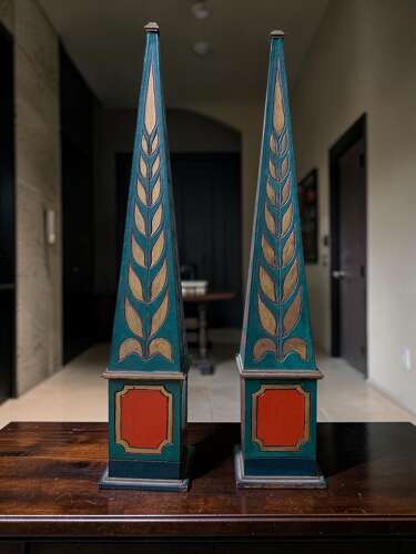 A DECORATIVE PAIR OF POLYCHROME PAINTED OBELISKS