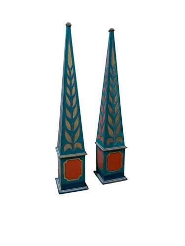 A DECORATIVE PAIR OF POLYCHROME PAINTED OBELISKS