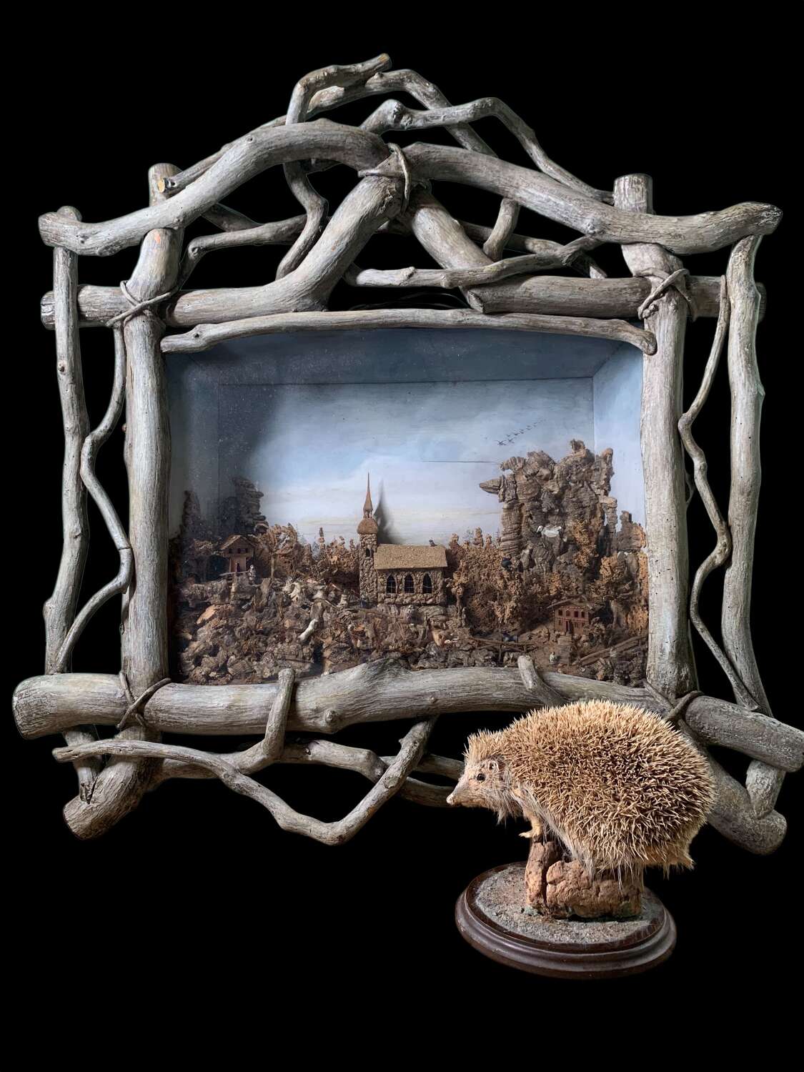 FINEST ANTIQUE CORK DIORAMA WITH TWIG FRAME