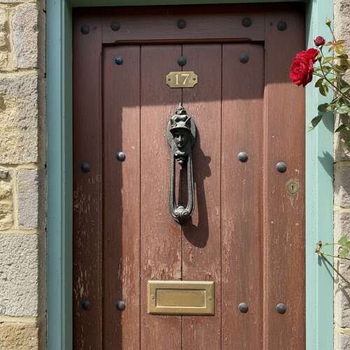 VICTORIAN CAST IRON DOOR KNOCKER WITH HERMES HEAD