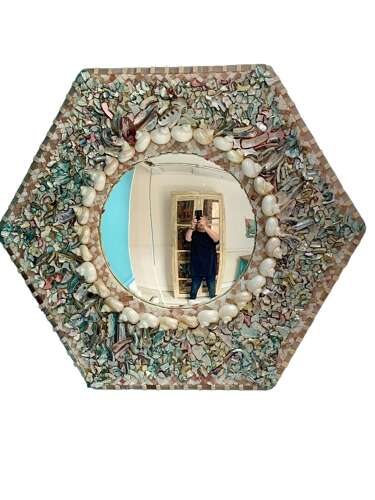 A LARGE SHELL WORK CONVEX WALL MIRROR