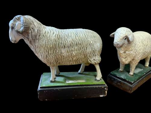 A MID CENTURY COLLECTION OF PLASTER SHEEP MODELS