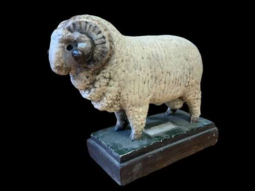 A MID CENTURY COLLECTION OF PLASTER SHEEP MODELS